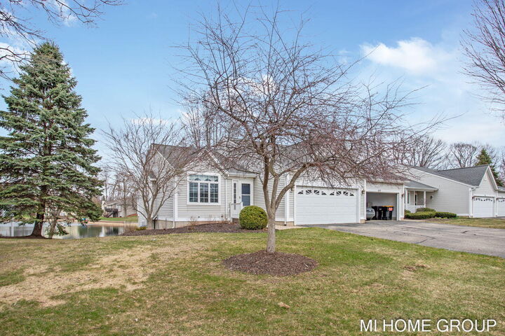 Property Photo:  319 Winter Oak E  MI 49424 