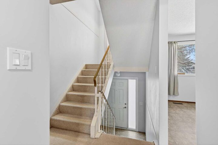 Property Photo: 1502 Ranchlands Way NW AB T3G 1R2