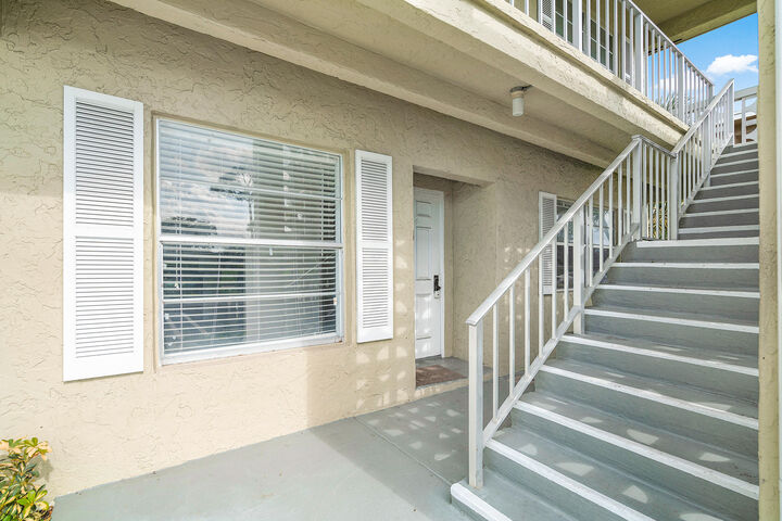 Property Photo:  1021 Flame Vine Avenue 104  FL 33445 