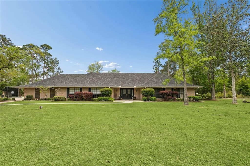 Property Photo:  122 Rue De La Paix  LA 70461 