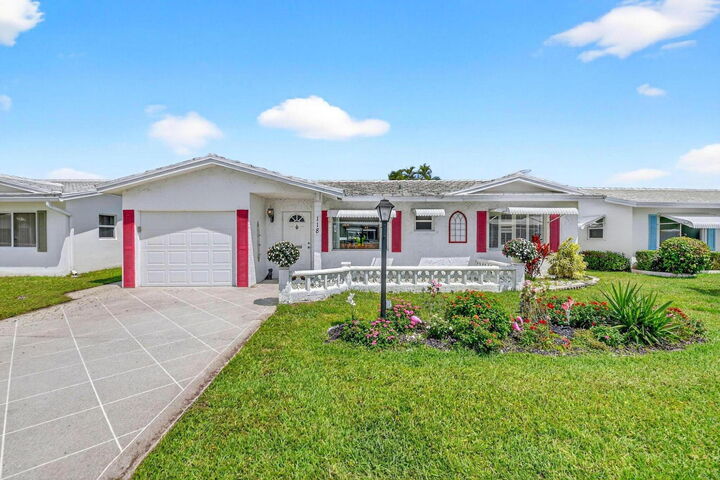 Property Photo: 118 SW 9th Street FL 33426