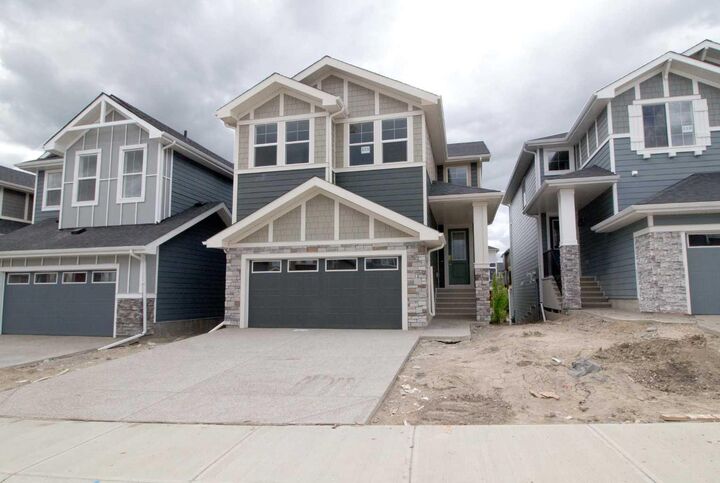 Property Photo: 115 Sundown Crescent AB T4C 1Y3
