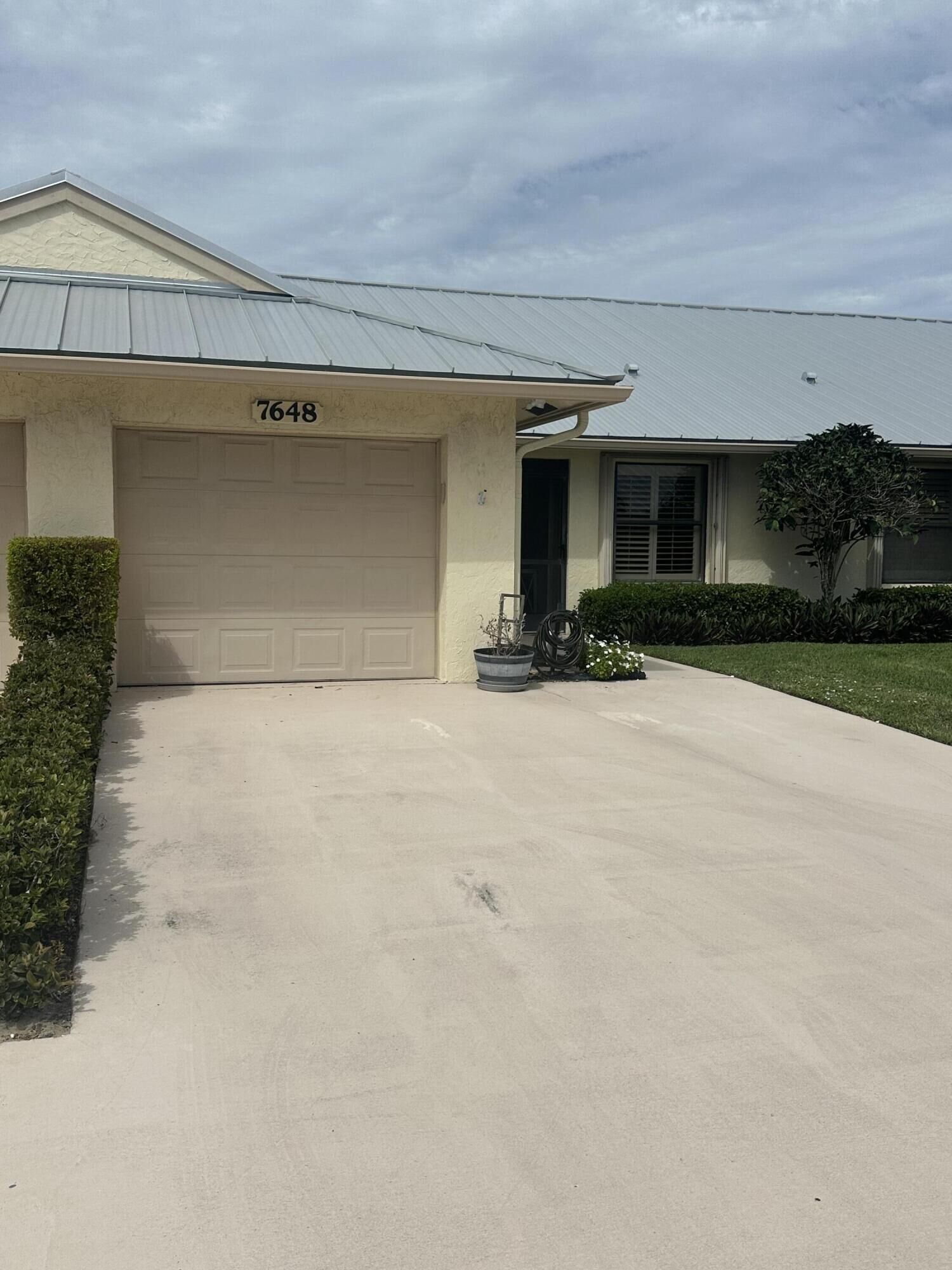Property Photo:  7648 SE Sugar Sand Circle  FL 33455 