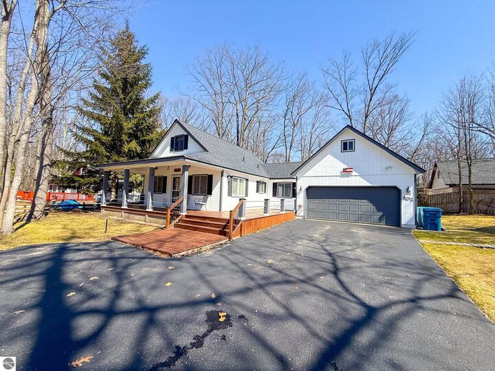 Property Photo:  402 Sheffield Drive  MI 48653 