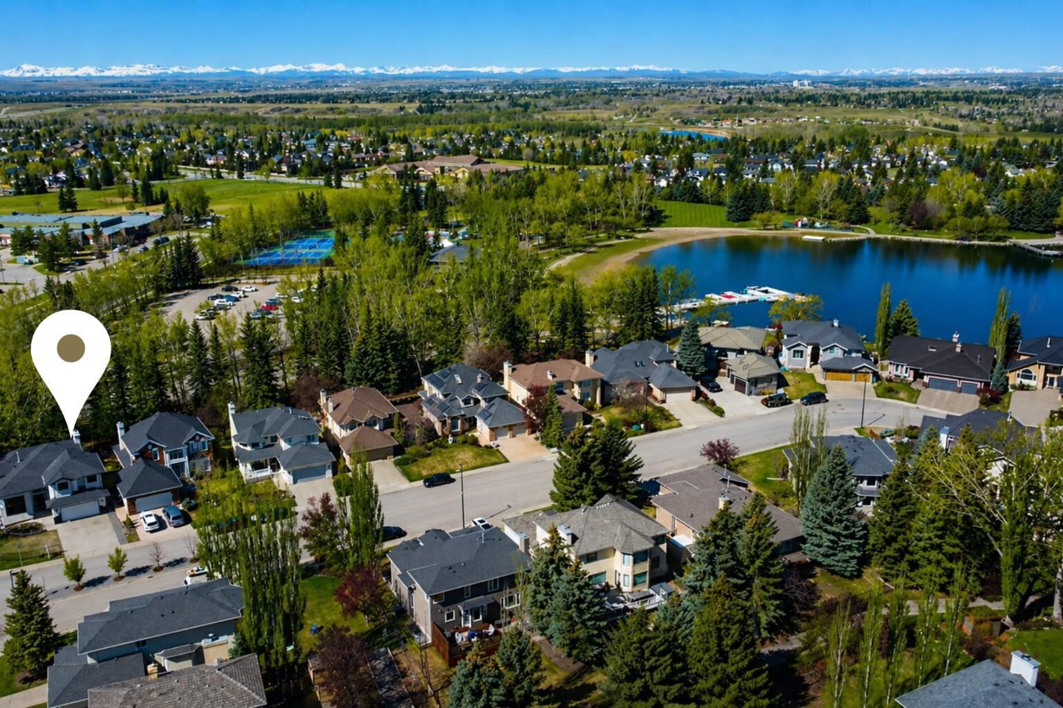 Property Photo:  5 McKenzie Lake Point SE  AB T2Z 1L7 