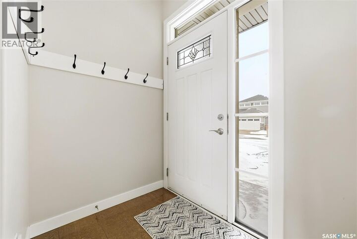 Property Photo:  5668 Pearsall Crescent  SK S4W 0K2 