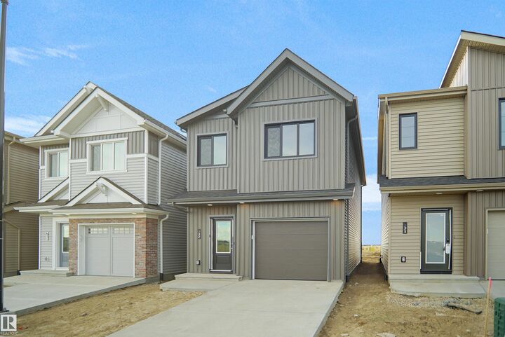 Property Photo: 1430 Aster Way NW 32 AB T6T 2N8