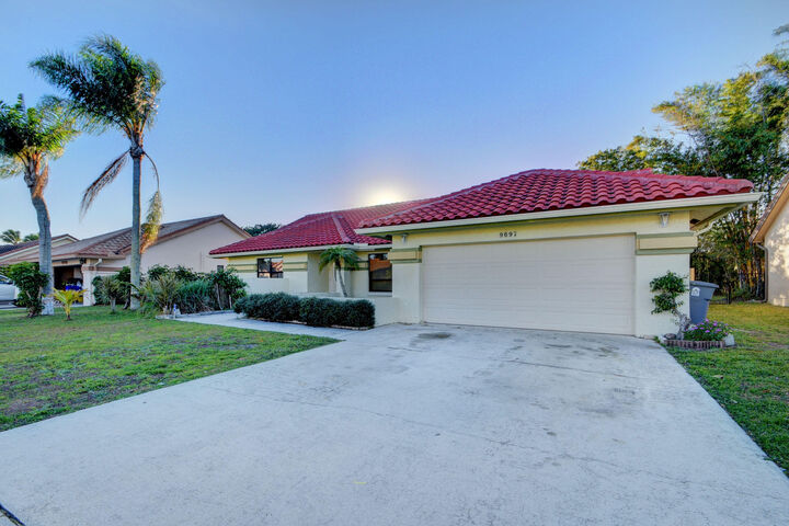 Property Photo: 9697 Majestic Way FL 33437