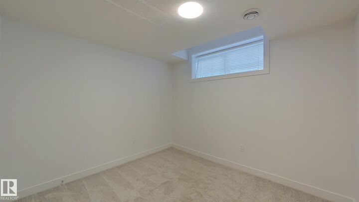 Property Photo: 1037 Aster Boulevard NW Bsmt AB T6T 1J1