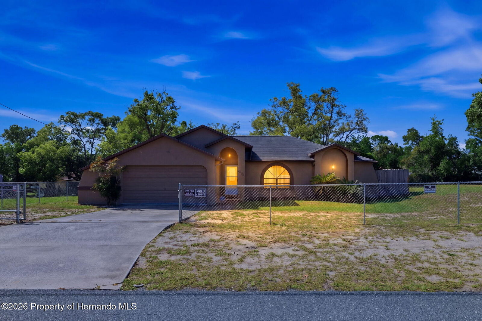 Property Photo:  10464 Maderia Street  FL 34608 