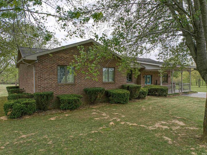 Property Photo:  1899 W Kelly Road  IN 47601 