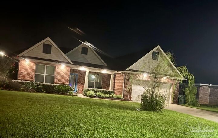Property Photo:  9905 Boxelder Blvd  FL 32526 