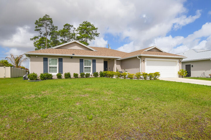Property Photo: 3110 SW Curcuma Street FL 34953
