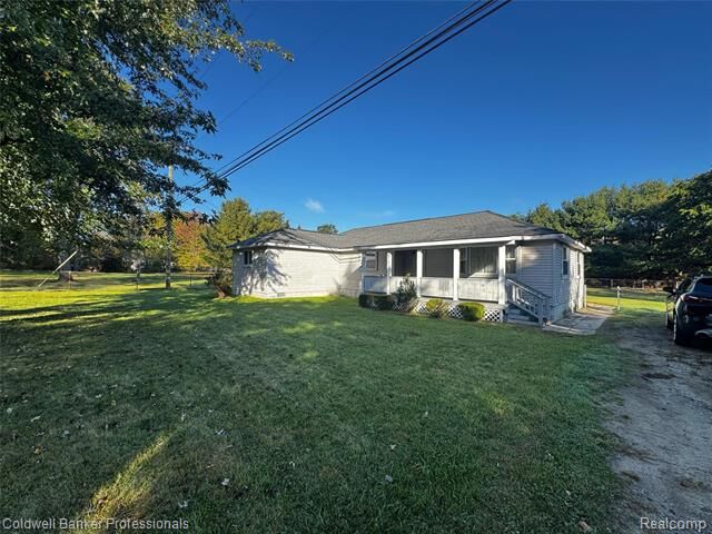 Property Photo:  904 Rowland Road  MI 48367 