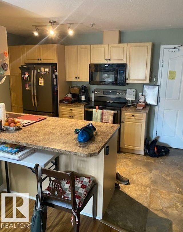 Property Photo: 78 A McKenney Avenue 404 AB T8N 7E6