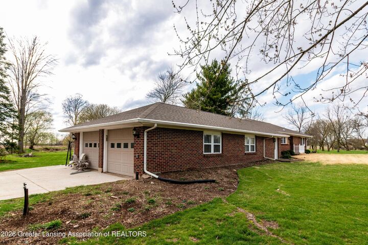 Property Photo:  3604 S Dewitt Road  MI 48879 