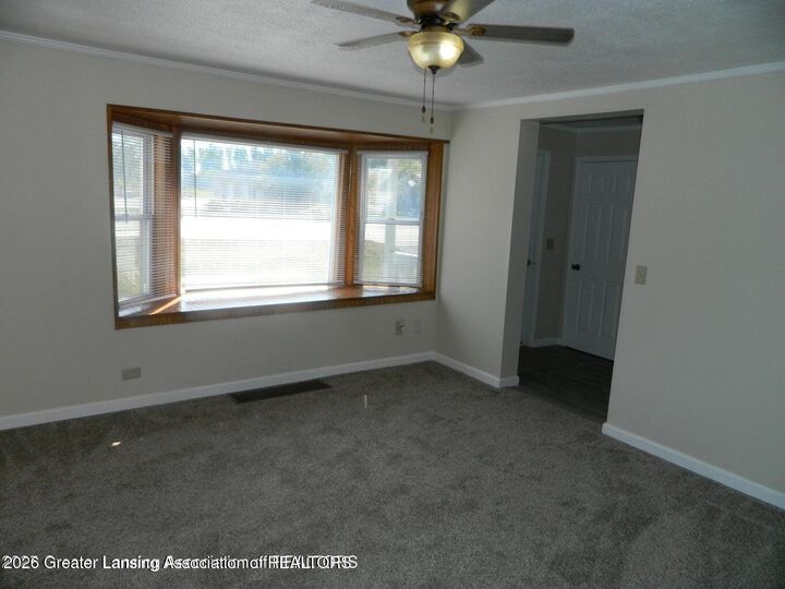 Property Photo:  2936 Jolly Road  MI 48864 