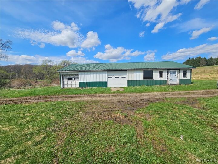 Property Photo:  7829 Jersey Hollow Road  NY 14755 