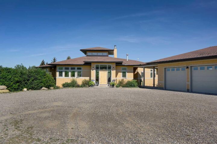Property Photo: 254069 Towers Trail AB T4C 2A3