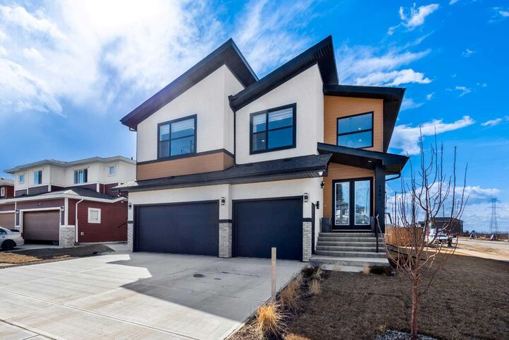 Property Photo: 1001 Waterford Drive SE AB T1X 2T7