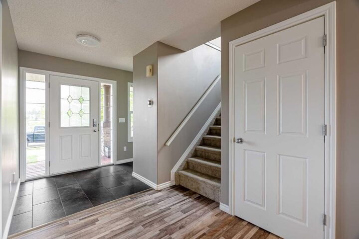 Property Photo:  203 Loutit Road  AB T9K 0L6 