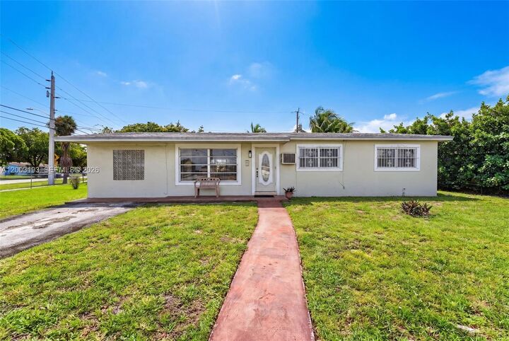 Property Photo:  20621 NW 24th Ct  FL 33056 