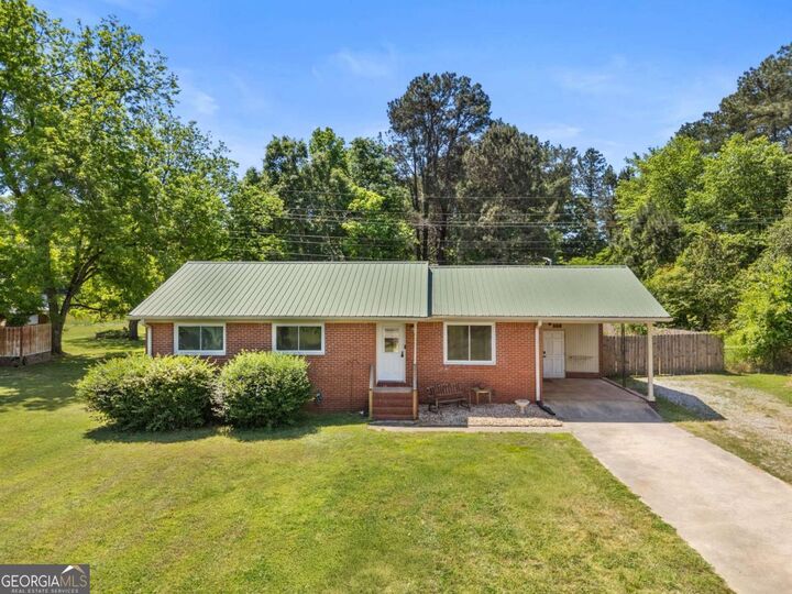 Property Photo:  1510 E Highway 16  GA 30233 