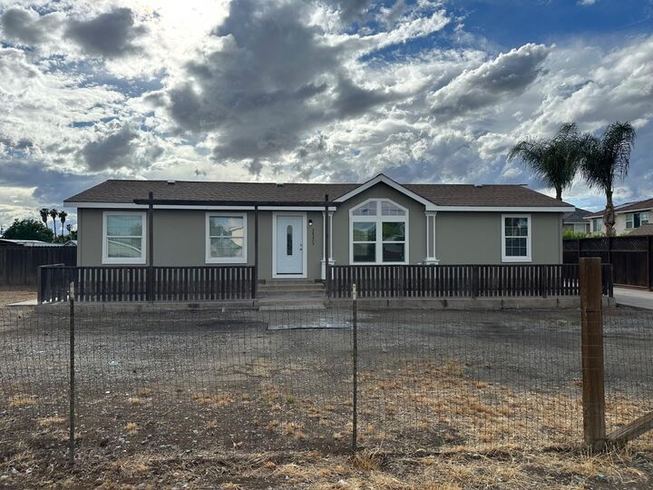 Property Photo:  28237 S Macarthur Drive  CA 95377 