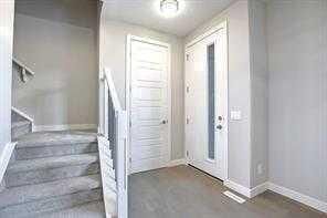 Property Photo: 241 Cobblestone Gate SW AB T4B 4Z9