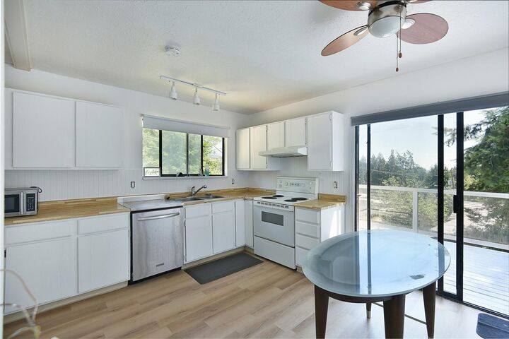 Property Photo:  5727 Trail Avenue  BC V7Z 0H8 