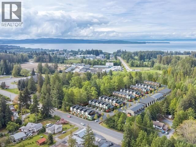 Property Photo:  204-5191 Manson Ave  BC V8A 3P2 
