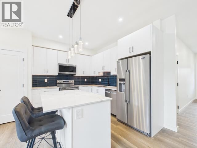 Property Photo:  102-5191 Manson Ave  BC V8A 3P2 