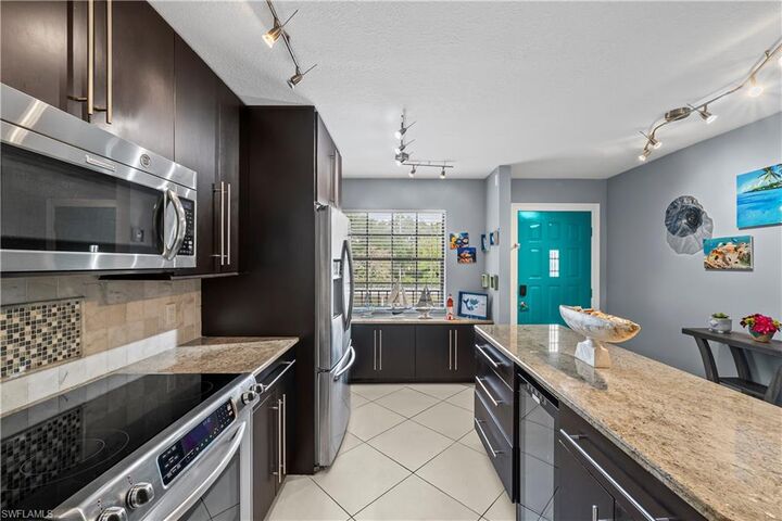 Property Photo:  5535 Rattlesnake Hamm Rd 205  FL 34113 
