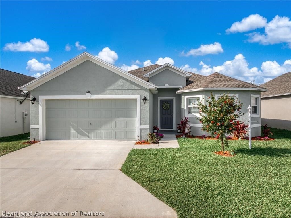 Property Photo:  648 W Carmichael Street  FL 33825 