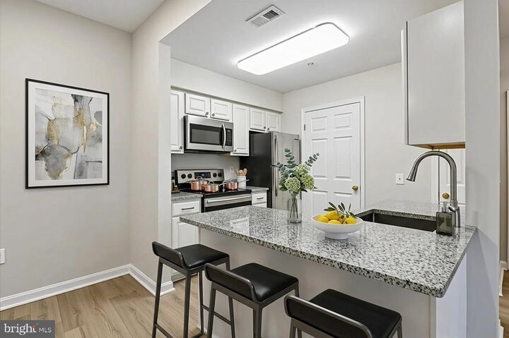 Property Photo:  2001 Warners Terrace N 104  MD 21401 