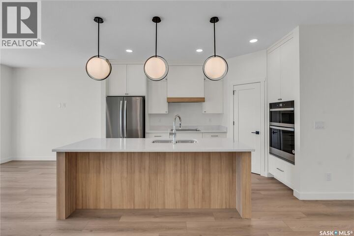 Property Photo:  6 720 Brighton Boulevard  SK S7V 1X1 