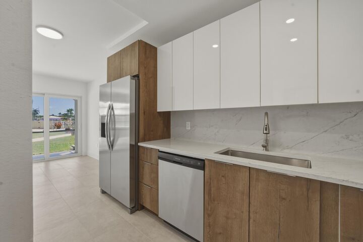 Property Photo: 700 Pine Drive 105 FL 33060