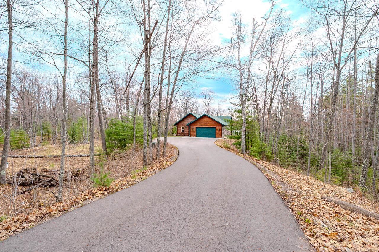 Property Photo:  4387 Double Oaks Trail  WI 54501 