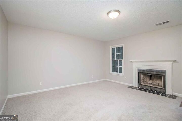 Property Photo:  1560 Red Briar Way  GA 30236 