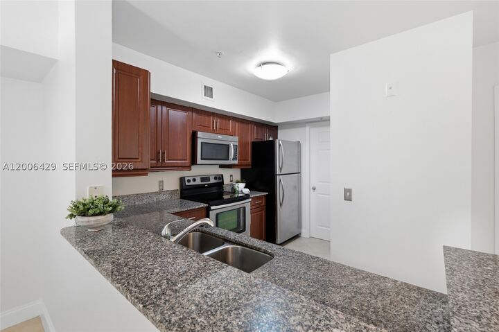 Property Photo:  2451 Centergate Dr 303  FL 33025 