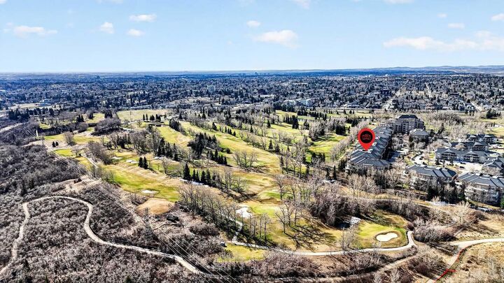 Property Photo:  14 Hemlock Crescent SW 7304  AB T3C 2Z1 