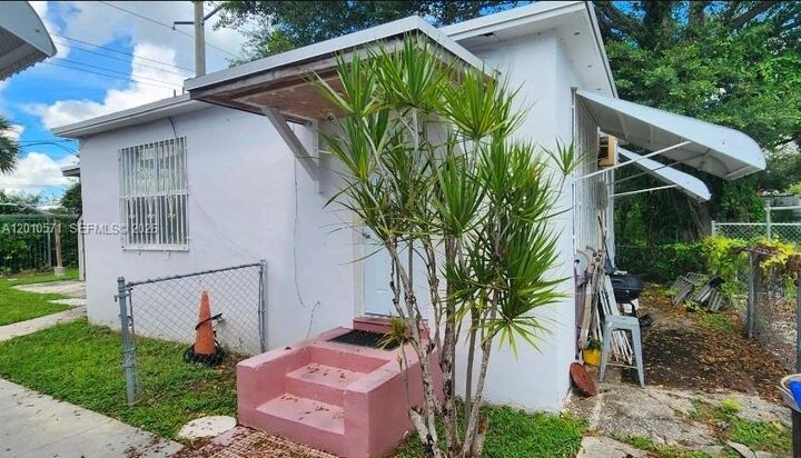 Property Photo:  405 NW 64th St 3  FL 33150 