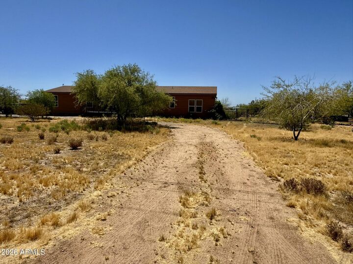 Property Photo:  22455 W Hylton Way  AZ 85332 