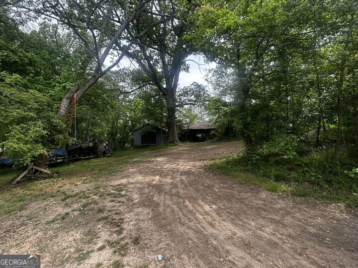 Property Photo:  4854 Stonewall Tell Road SW  GA 30349 