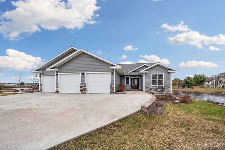 Property Photo:  4017 Mariner Court  MI 49931 