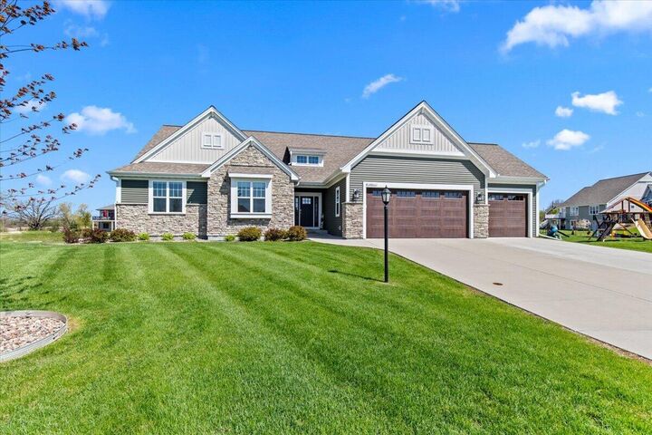 Property Photo:  W158n6711 Tamarack Trl  WI 53051 