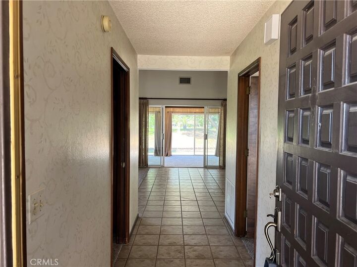 Property Photo:  14879 Tournament  CA 92342 