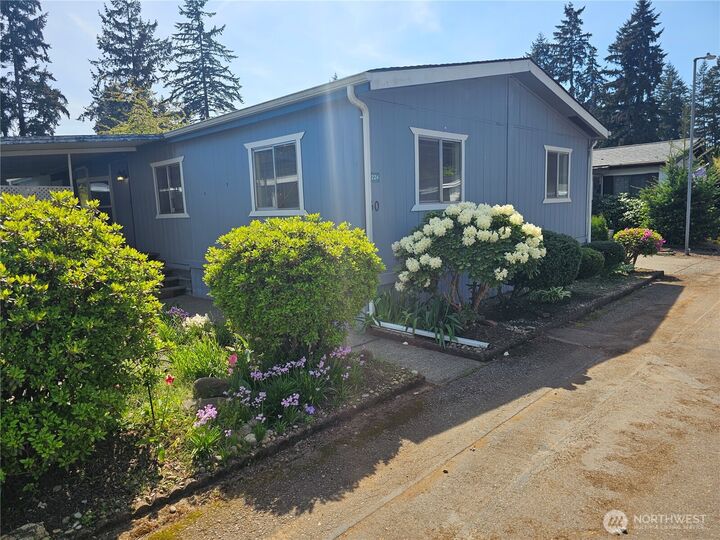 Property Photo:  11224  124th Street Ct E 60  WA 98374 
