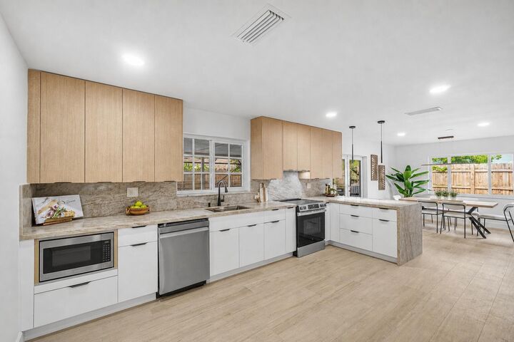 Property Photo:  718 SW 27th Place  FL 33435 