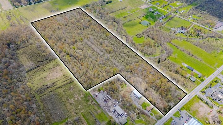 Property Photo:  7807 Transit Road  NY 14051 